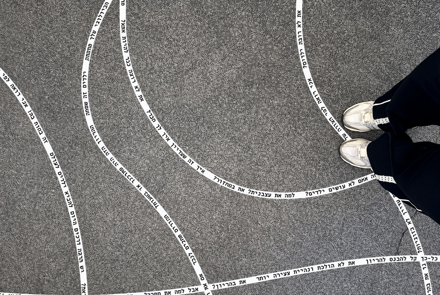 Phrases printed on the floor of the installation